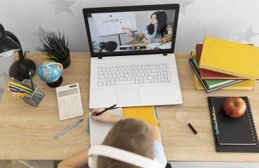 close-up-kid-learning-online